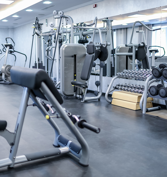 diverse-female-physiotherapist-helping-senior-male-2026-01-09-09-38-06-utc